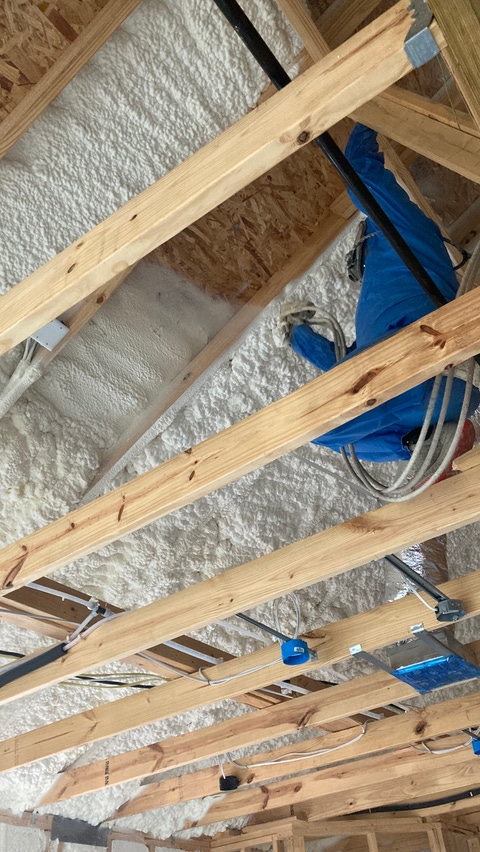 Image of ENERTITE X BASF Open-cell- SPray Polyurethane Foam installed in an overhead cavity