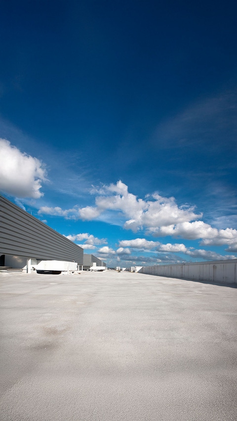 Closeup of SKYTITE spray foam roofing system applied to a flat roof Closeup of SKYTITE spray foam roofing system applied to a flat roof