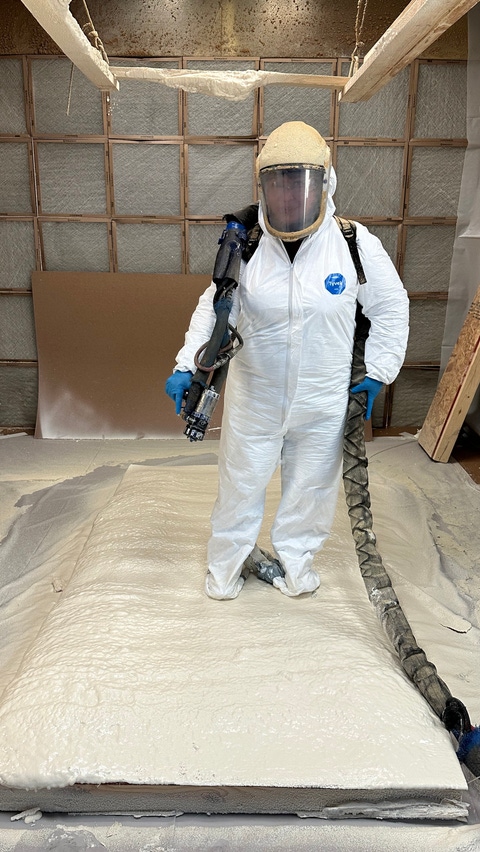 Image of a person wearing the full PPE for Spray Polyurethane Foam Application